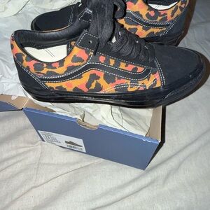 Vans Leopard and Black Old Skool Sneakers